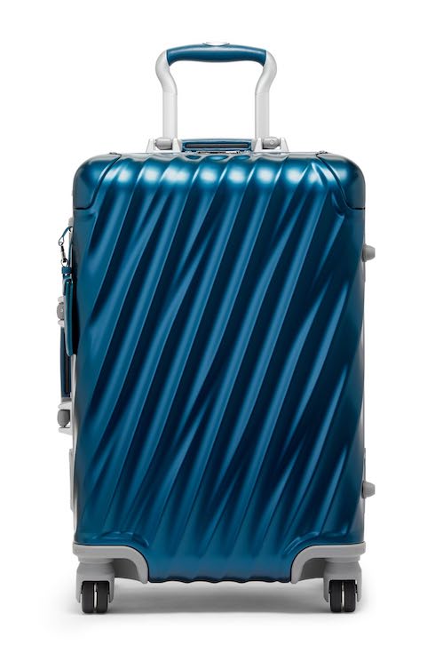TUMI 19 Degree Aluminum International 4 Wheeled Carry-On in Dark Denim on a white background for Home Network Best Carry-On Luggage