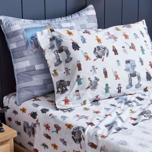 LEGO-themed organic bed sheets for children by retailer Pottery Barn Kids