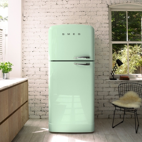 A pastel green fridge by Smeg, a home appliance trend for 2025