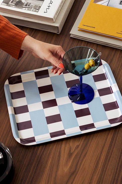 Checkered tray with martini on it