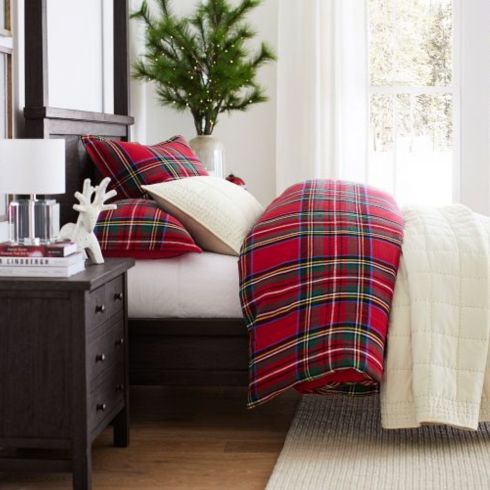 Tartan bedsheets in a bedroom