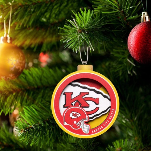 A round ornament with the Kansas City Chiefs logo on it