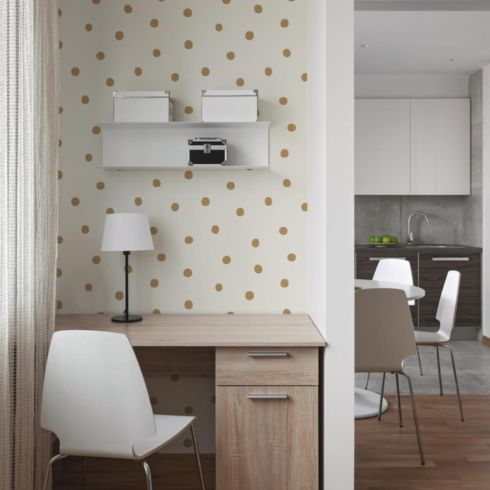 Home office with polka-dot peel and stick wallpaper