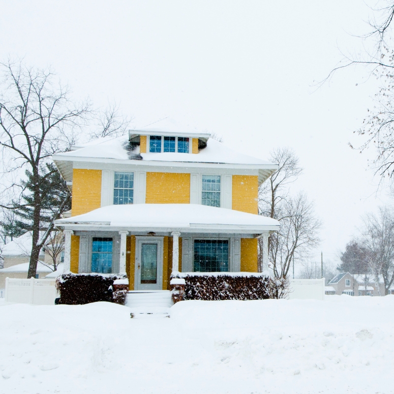 A detached house in Canada covered in snow