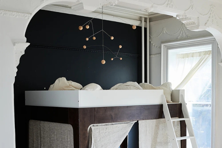 Oeuf Loft Bed with mobile on the ceiling