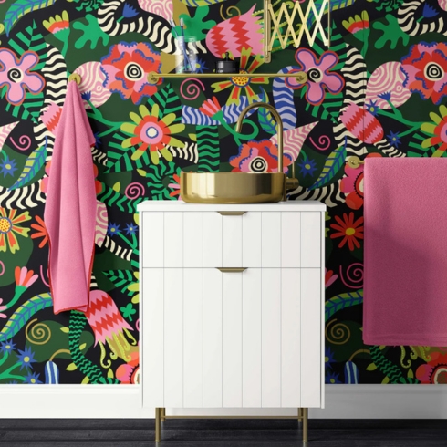 Bold flower Peel and stick floral wallpaper featured behind a sink.