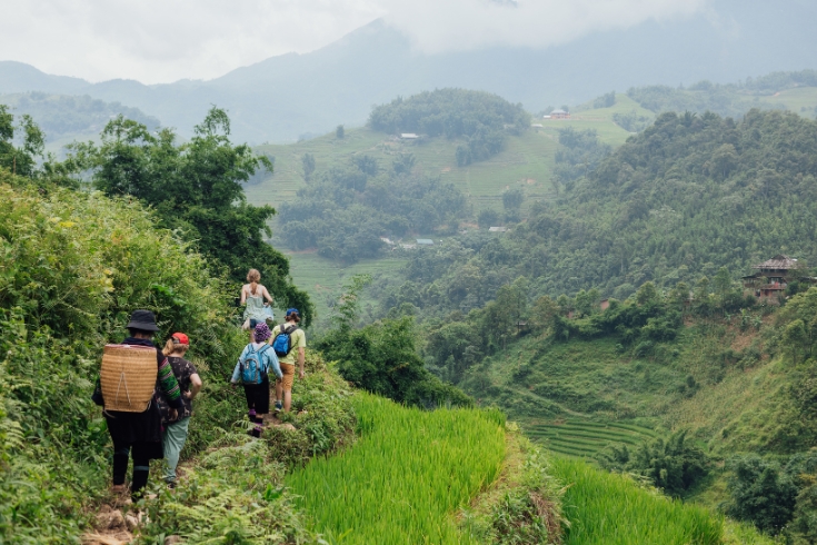 Friends hiking together in Vietnam