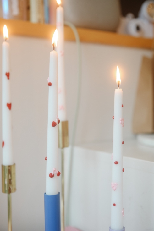 painted candles in pink and red