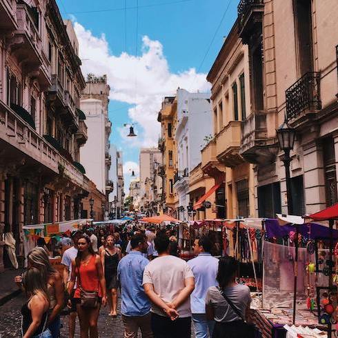 People Standing on Road Beside Market and High-rise Buildings in San Nicolas, CABA, Argentina