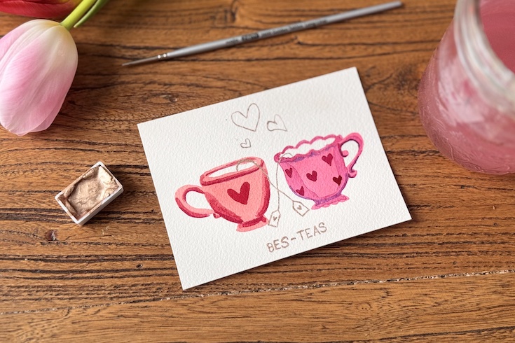 watercolour painted teacups with added heart deatails