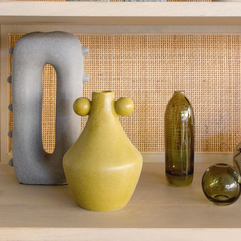 yellow and grey vases and glassware