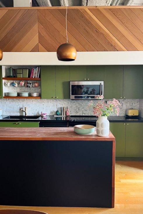 Green cabinets in kitchen