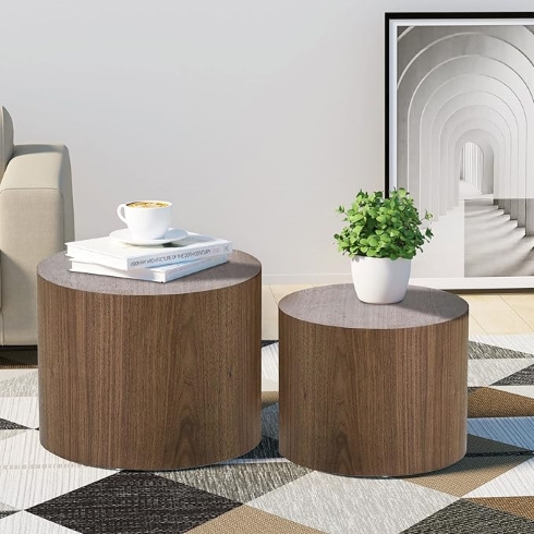 Nesting coffee tables in wood style.