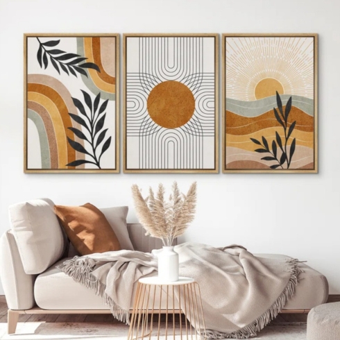 Three pieces of geometric art featuring sun, desert and plants.