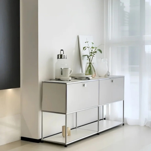 White modern storage cabinet against the wall.