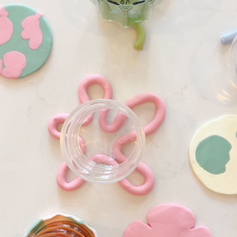 clay colourful coasters in different shapes are forms