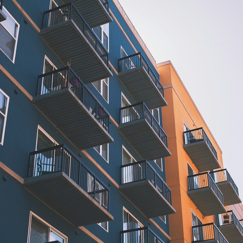 Apartment buildings in blue and orange