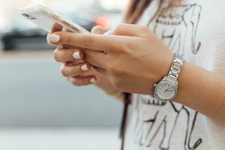 Woman looking at cell phone