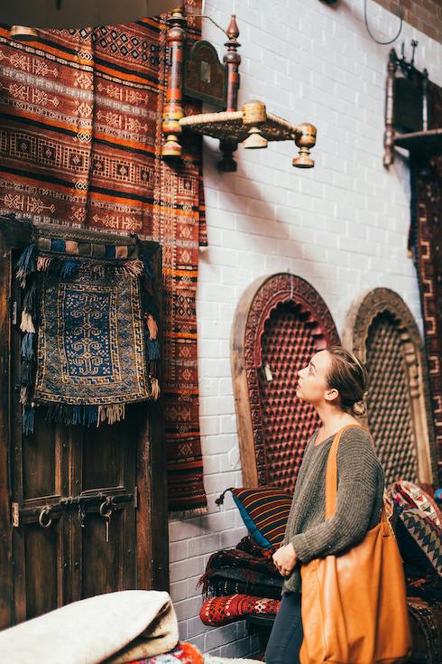 Woman browsing an antique market