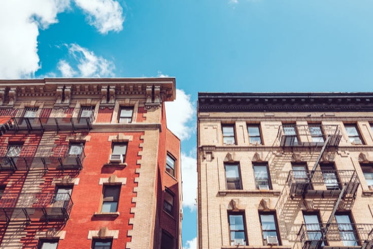 Classic residential buildings in midtown upper Manhattan - stock photo.