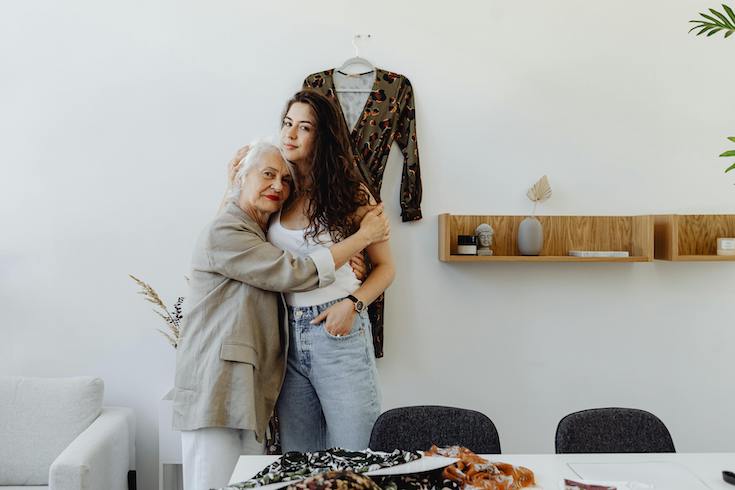 A Grandmother and Granddaughter Hugging Each Other