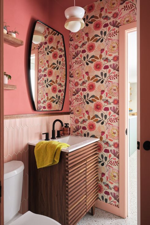 Pink bathroom with wallpaper