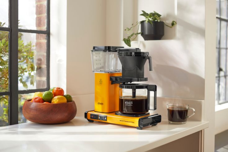 Bright yellow Moccamaster coffee maker