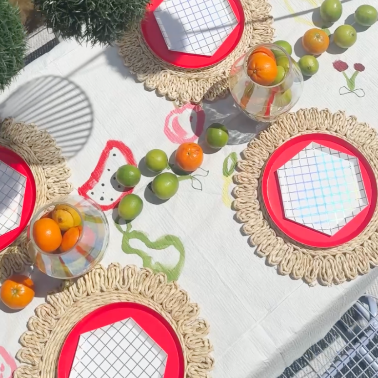 dreamy picnic table setup with fresh limes and clementines