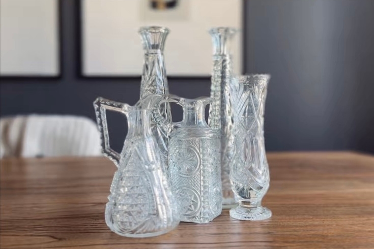 Glass bud vases in various shapes.
