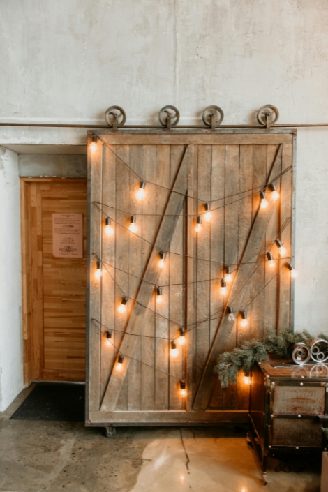 Yellow String Lights On Brown Wooden Door.