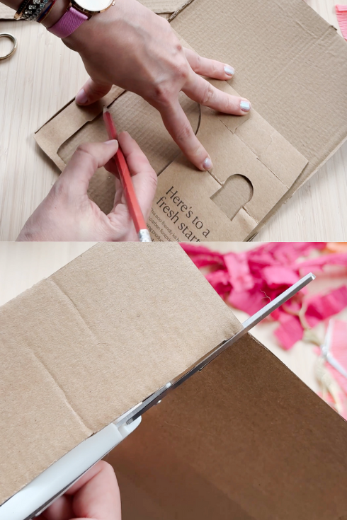 drawing on a leftover cardboard a shape for a mini pinata