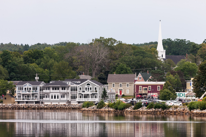 The bay and harbour of Mahone Bay, Nova Scotia on August 30, 2017. Founded in 1754 Mahone Bay is small town located along the south shore of Nova Scotia in Lunenburg County. Orignally known for its wooden ship builders, today the town has a number of upscale restaurants and stores designed to attract tourists.