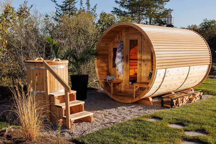 Rustic wood sauna and hot tub