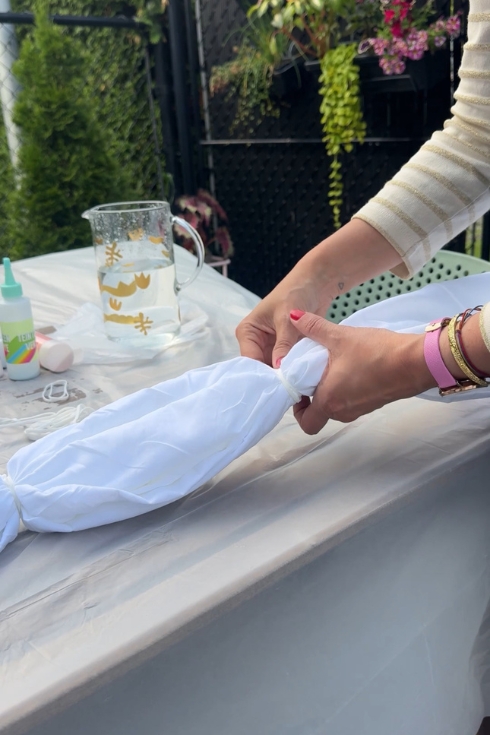 Folding and banding fabric to create sections.