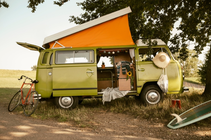Van with roof tent in the nature.