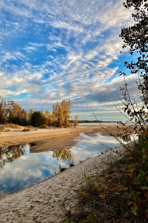 A sun setting over one of Ontario’s best sandy beaches 