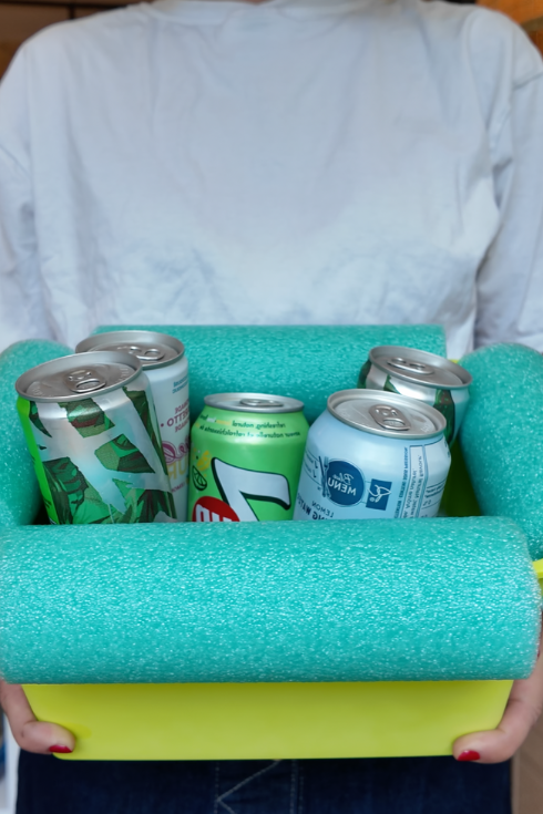 Floating pool cooler with drinks inside 