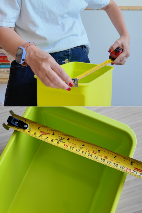 measuring with a tape a green plastic container
