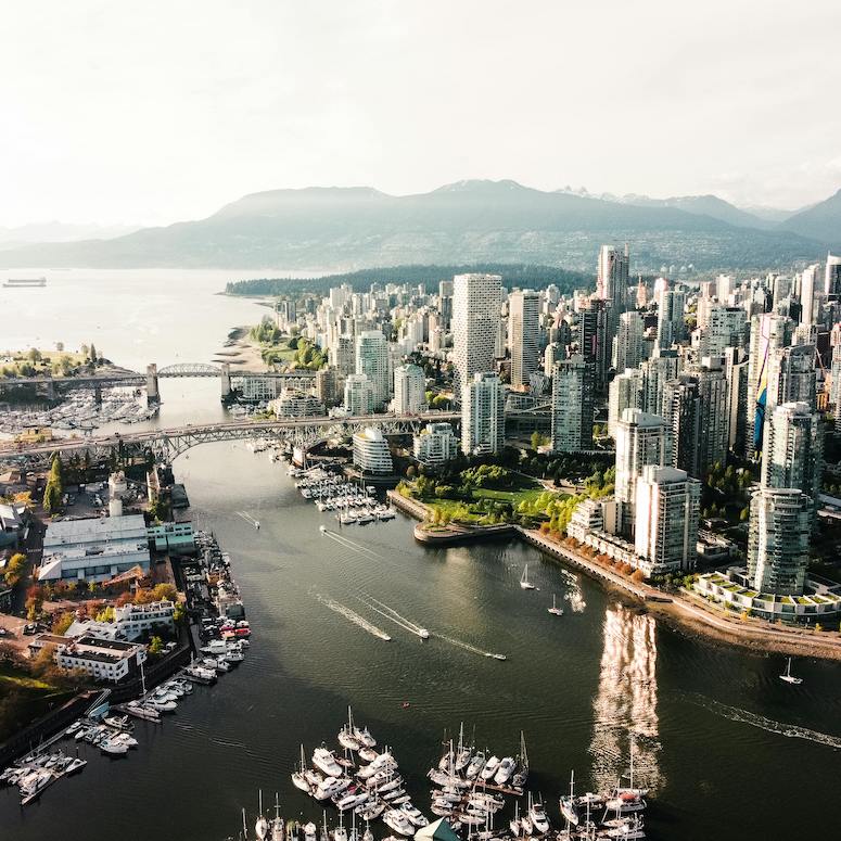 Aerial shots of tall buildings in downtown Vancouver, BC, as part of a travel post for HOME Network