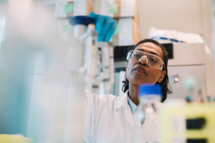 Female healthcare worker doing research in laboratory