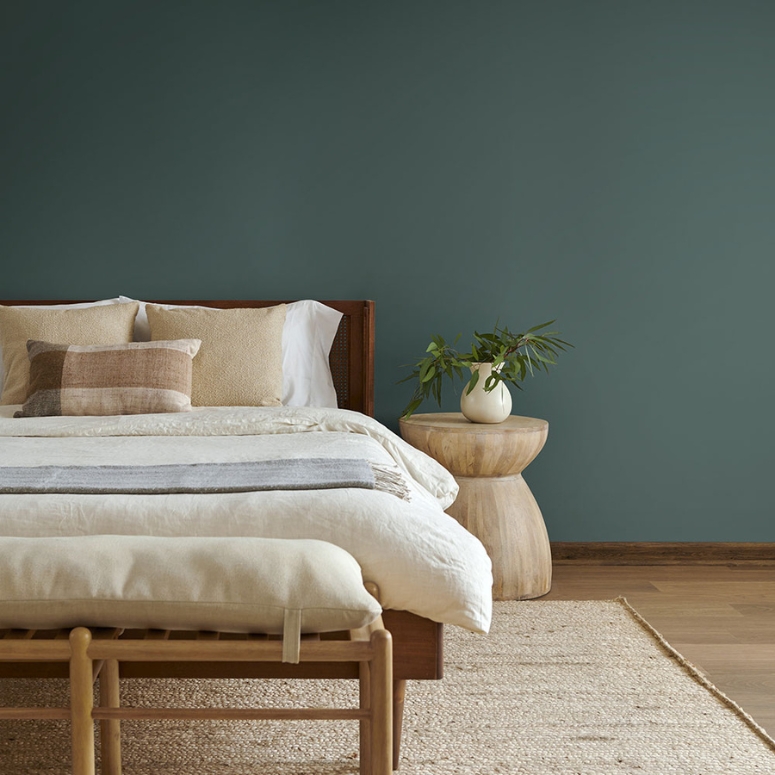 Bedroom painted in Hidden Gem hue from Behr.
